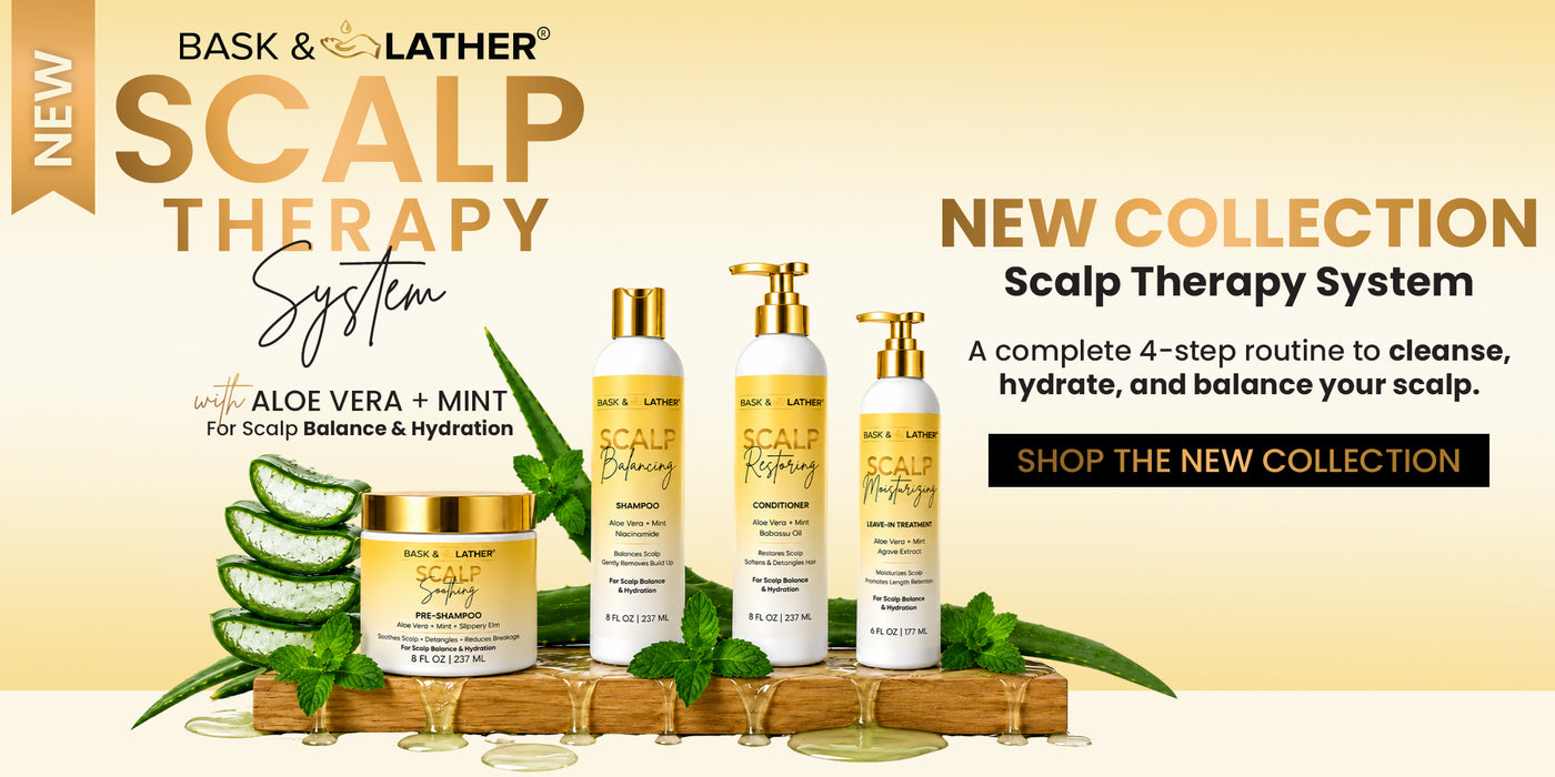 Bask & Lather Scalp Therapy System collection featuring a jar and four bottles with gold caps, displayed on a wooden tray with aloe vera leaves and gold liquid, set against a beige background with promotional text.